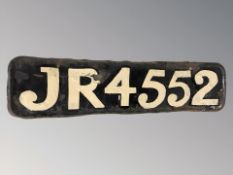 An early car registration plate JR4552.