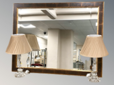 A modern bevelled and gilt overmantel mirror, width 114 cm,