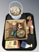 A group of vintage toys and dolls,