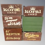 A group of painted pine bottle crates,