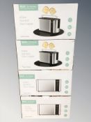 Four boxed Homasy stainless steel toasters.