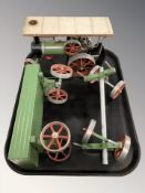 A Mamod steam engine, a trailer and a further axle.