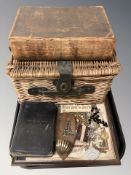 Two antique bibles, a small wicker hamper, religious panel, rosary beads and similar items.