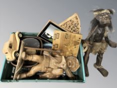 A group of ethnic carvings, statues,