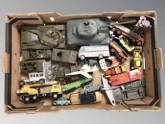 A group of die cast plastic military vehicles including tanks,