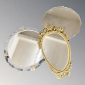 An Art Deco frameless bevelled mirror, diameter 51 cm, a modern frameless mirror and a gilt mirror.