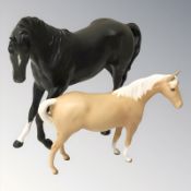 Two Beswick matt glazed horses, one black and one Palomino,