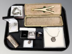 A group of silver jewellery, dress rings, padlock bracelet, pair of glove stretchers in fitted box,