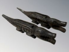 A pair of African carved hardwood pen stands in the form of crocodiles,