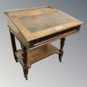 A late Victorian oak writing desk with presentation plaque dated 1885, 71 cm W x 67 cm D x 81 cm H.