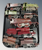 A group of 20th century tin plate locomotives and tenders.