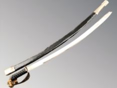 A reproduction Indian sabre in sheath