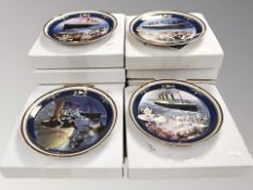 A group of Bradford Exchange Titanic collector's plates in boxes.