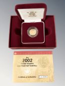 Queen Elizabeth II 2002 Gold Proof Half Sovereign, with certificate of authenticity, boxed.
