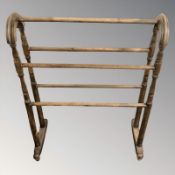 A Victorian beech towel rail,