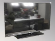A Sharp 39 inch LCD TV with lead no remote