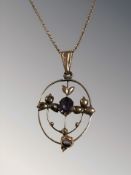 An Edwardian gold and amethyst pendant on 9 ct gold chain CONDITION REPORT: 3.