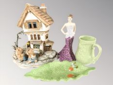 A Pendelfin house, two rabbits, Wade jug,