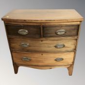 A Regency style bow fronted mahogany four drawer chest,