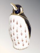 A Royal Crown Derby Penguin paperweight with gold stopper