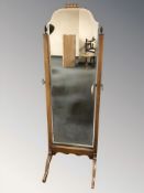 An Art Deco walnut cheval mirror,