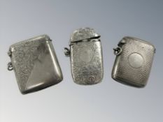 Three antique silver vesta cases, largest 6 cm long. CONDITION REPORT: 72.6g gross.