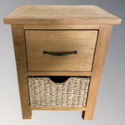 A modern oak two drawer bedside stand,