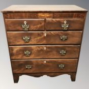A George III mahogany five drawer chest,