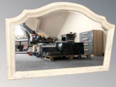 A contemporary marble effect overmantel mirror 109 cm x 71 cm