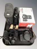 A Canon EOS 450D camera in box with accessories, pair of Greenkat 12 x 30 binoculars,