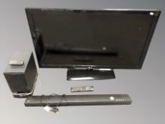 An LG 42 inch LCD TV with lead,