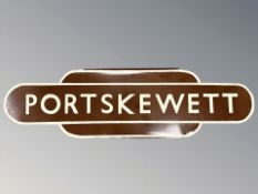 A late-20th century reproduction enameled metal railway totem 'Portskewett', 92 cm x 26 cm.