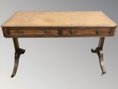 A Regency style mahogany and leather inset two drawer sofa table,