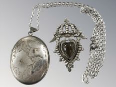 A silver locket, length 4.5cm.