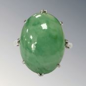 An antique 18ct gold jade ring,