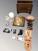 A carved oak magazine rack together with other treen items, table lamp, digital camcorder,