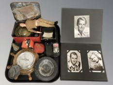 An album containing movie star monochrome photographs, quantity of Brooke Bond tea cards,