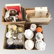 A quantity of home wares, ceramic planters, bottles, boxes and baskets,