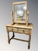 A reproduction oak two drawer side table, width 90 cm,