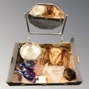 An Art Deco chrome octagonal swing mirror, pair of amber glass candlesticks,