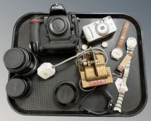 A Nikon D2X camera body, a Canon EF-S 17-85mm lens,