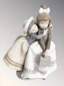 A Lladro figure - two girls 5720