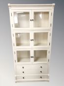 A modern painted bookcase,