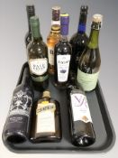Nine various bottles of alcohol including Cointreau, sherry, Merlot,