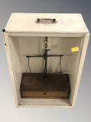 A set of chemist's scales in painted wooden case,