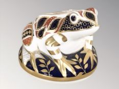 A Royal Crown Derby Frog paperweight with silver stopper