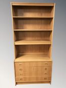 A teak and MDF open bookcase with drawers beneath 88 cm x 40 cm x 187 cm