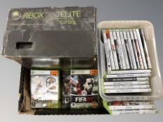 An Xbox 360 Elite console in box,