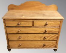 A Victorian satinwood five drawer chest,
