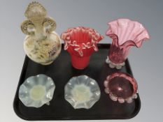 Pair of Vaseline glass pedestal dishes, two cranberry glass vessels, red glass vase with folded rim,